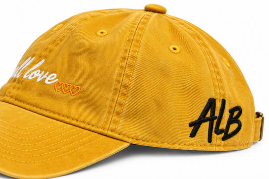 it’s all love… dad hat - Washed Mustard — side
